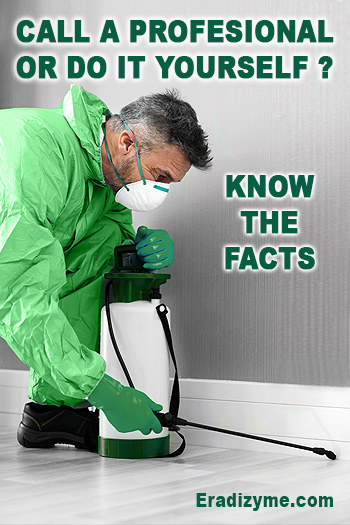 Exterminator in green coveralls spraying a home's baseboard while kneeling