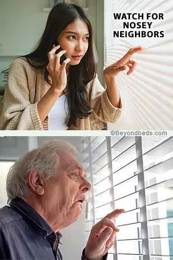 Two neighbors peeking through window blinds one woman on a phone and an older man watching intently